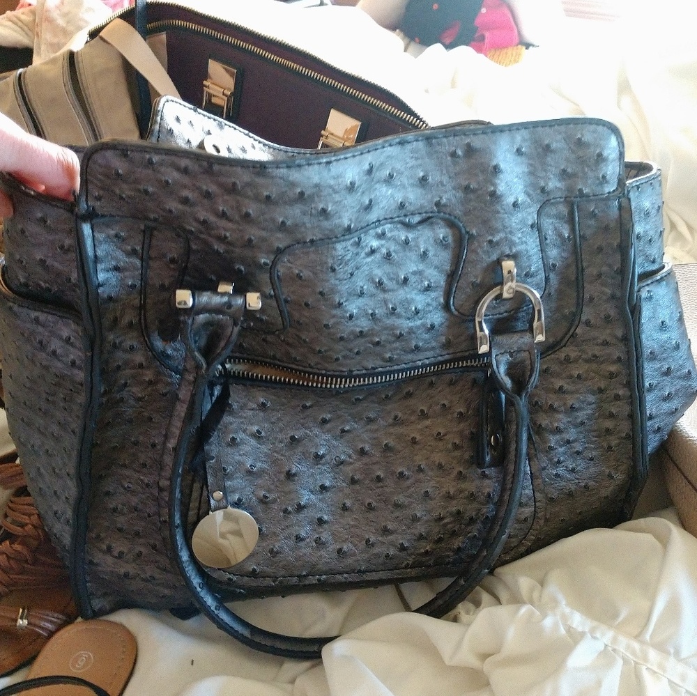 Gray purse with several pockets